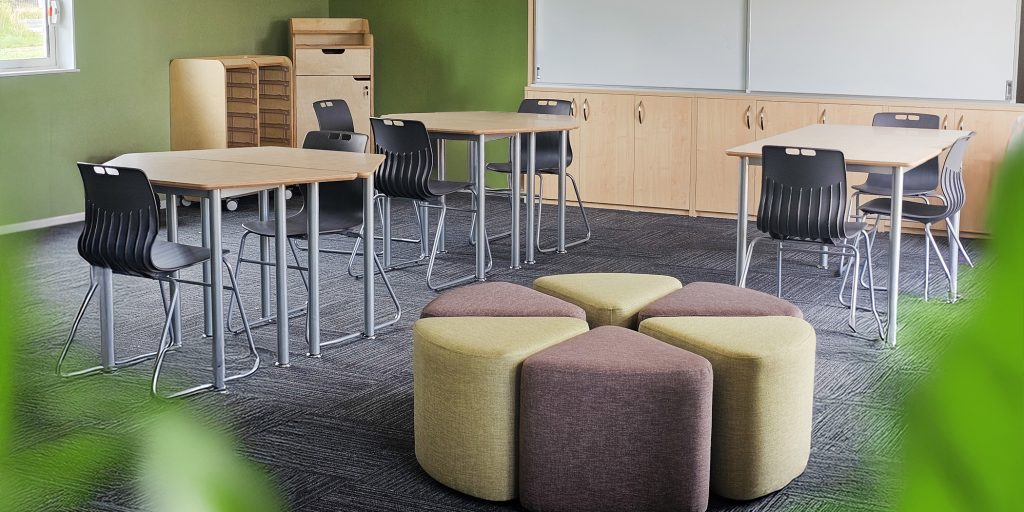 Managawhai Education Project with tuffet ottoman, whiteboard station, 4D Chair and birch plywood tables